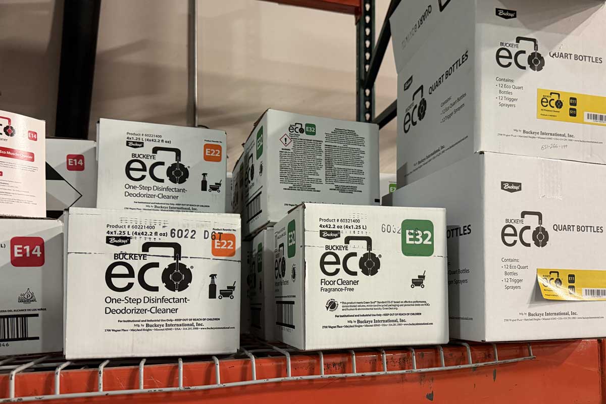 Stacked Buckeye Eco cleaning product boxes on shelf