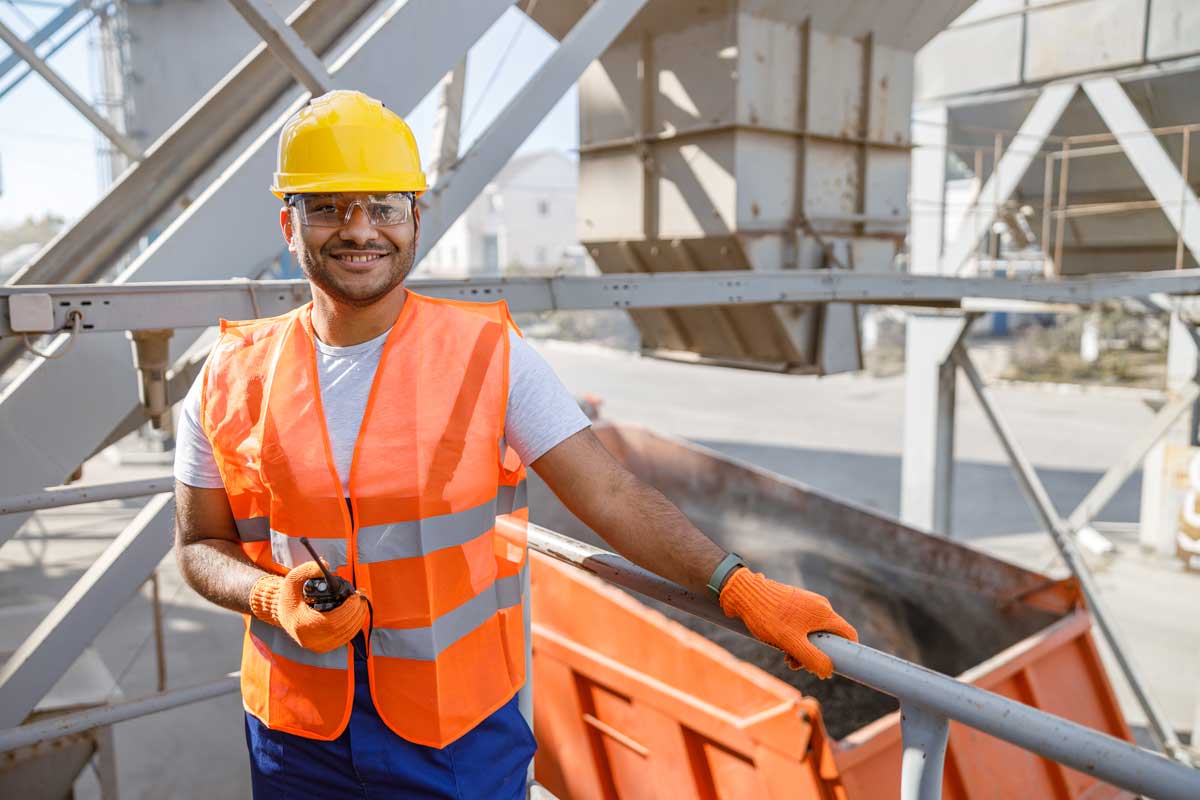 Smiling Young Construction Engineer Working on Clean up